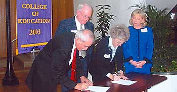ECU and WCC staff signs partnership agreement