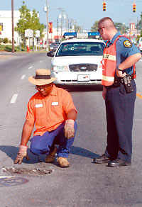 DOT worker Prentice Grady and Officer Jay Myers