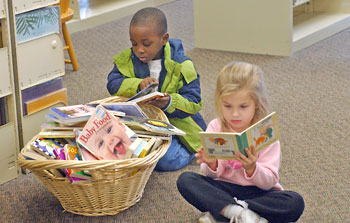 Kids reading at Wayne County Public Library
