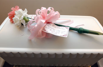 casket and flowers for Baby Jane Doe