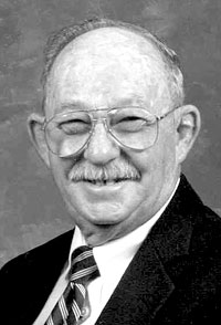 CECIL H. COOR